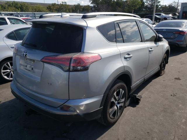 Photo 3 VIN: 2T3ZFREV3GW257027 - TOYOTA RAV4 LE 