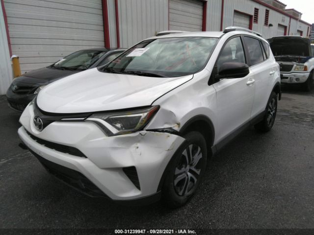 Photo 1 VIN: 2T3ZFREV3GW287340 - TOYOTA RAV4 