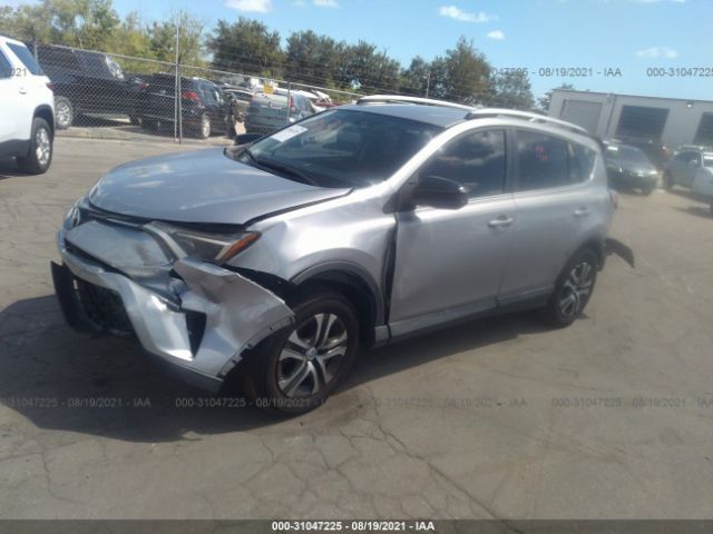 Photo 1 VIN: 2T3ZFREV4GW292546 - TOYOTA RAV4 