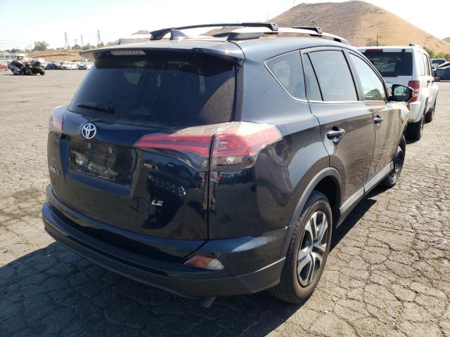 Photo 3 VIN: 2T3ZFREV4HW324297 - TOYOTA RAV4 LE 