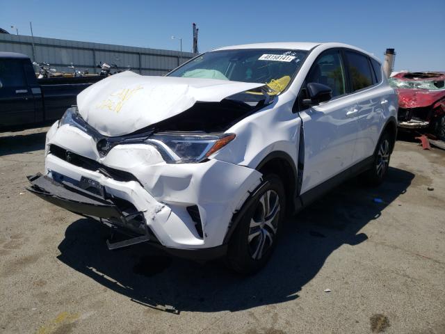 Photo 1 VIN: 2T3ZFREV4JW450035 - TOYOTA RAV4 LE 