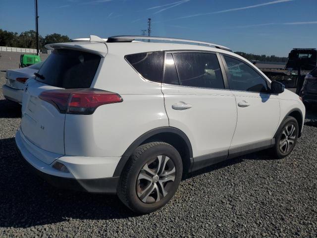 Photo 2 VIN: 2T3ZFREV5GW291518 - TOYOTA RAV4 LE 