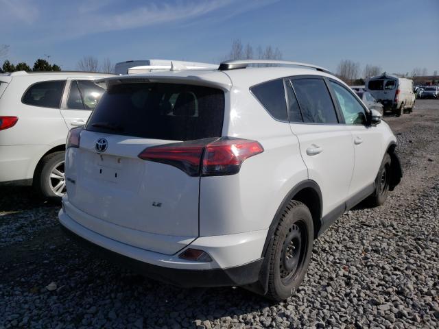 Photo 3 VIN: 2T3ZFREV6GW302638 - TOYOTA RAV4 LE 