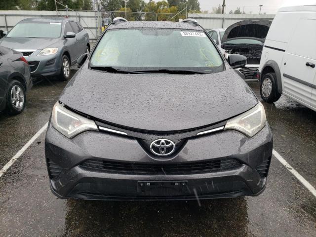 Photo 4 VIN: 2T3ZFREV7GW286319 - TOYOTA RAV4 LE 