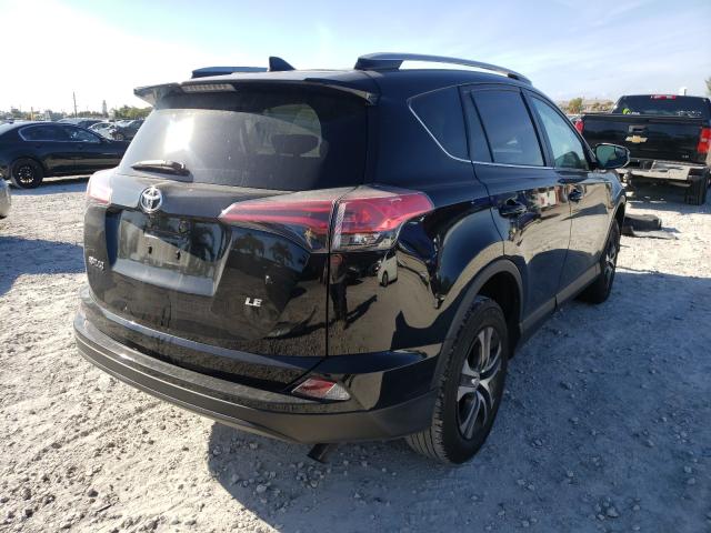 Photo 3 VIN: 2T3ZFREV7JW482395 - TOYOTA RAV4 LE 