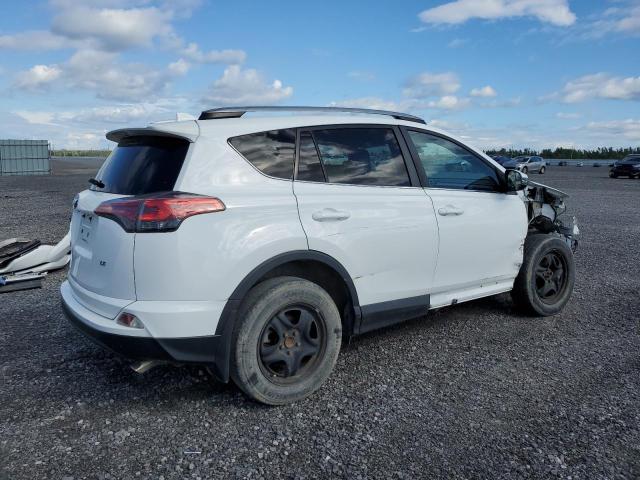 Photo 2 VIN: 2T3ZFREV8HW324027 - TOYOTA RAV4 LE 