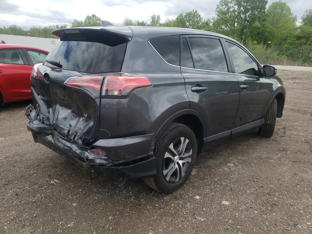 Photo 3 VIN: 2T3ZFREV9JW487324 - TOYOTA RAV4 LE 