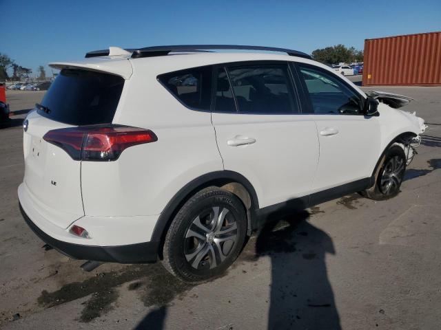 Photo 2 VIN: 2T3ZFREV9JW521441 - TOYOTA RAV4 LE 