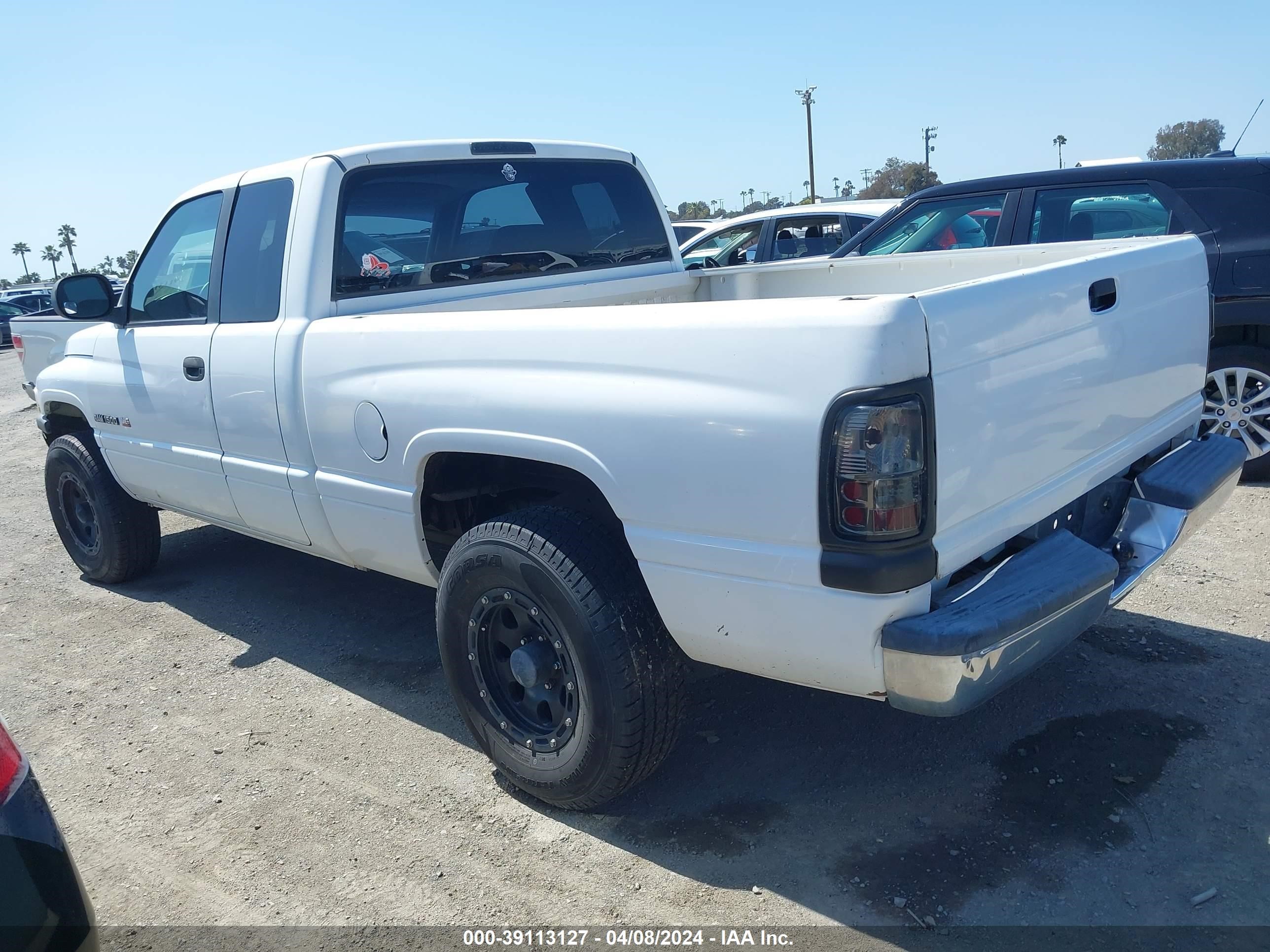 Photo 2 VIN: 3B7HC13Y1XM599466 - DODGE RAM 