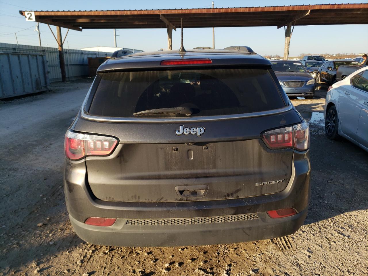 Photo 5 VIN: 3C4NJCABXKT769521 - JEEP COMPASS 