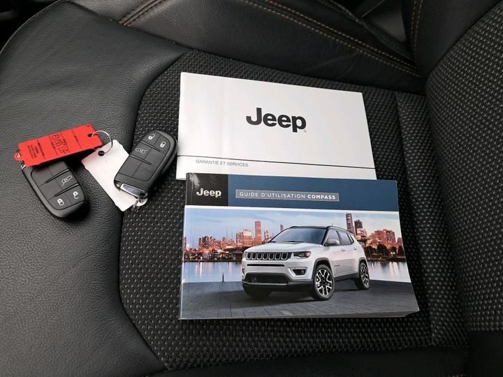 Photo 9 VIN: 3C4NJCCSXKT692131 - 52 JEEP COMPASS 