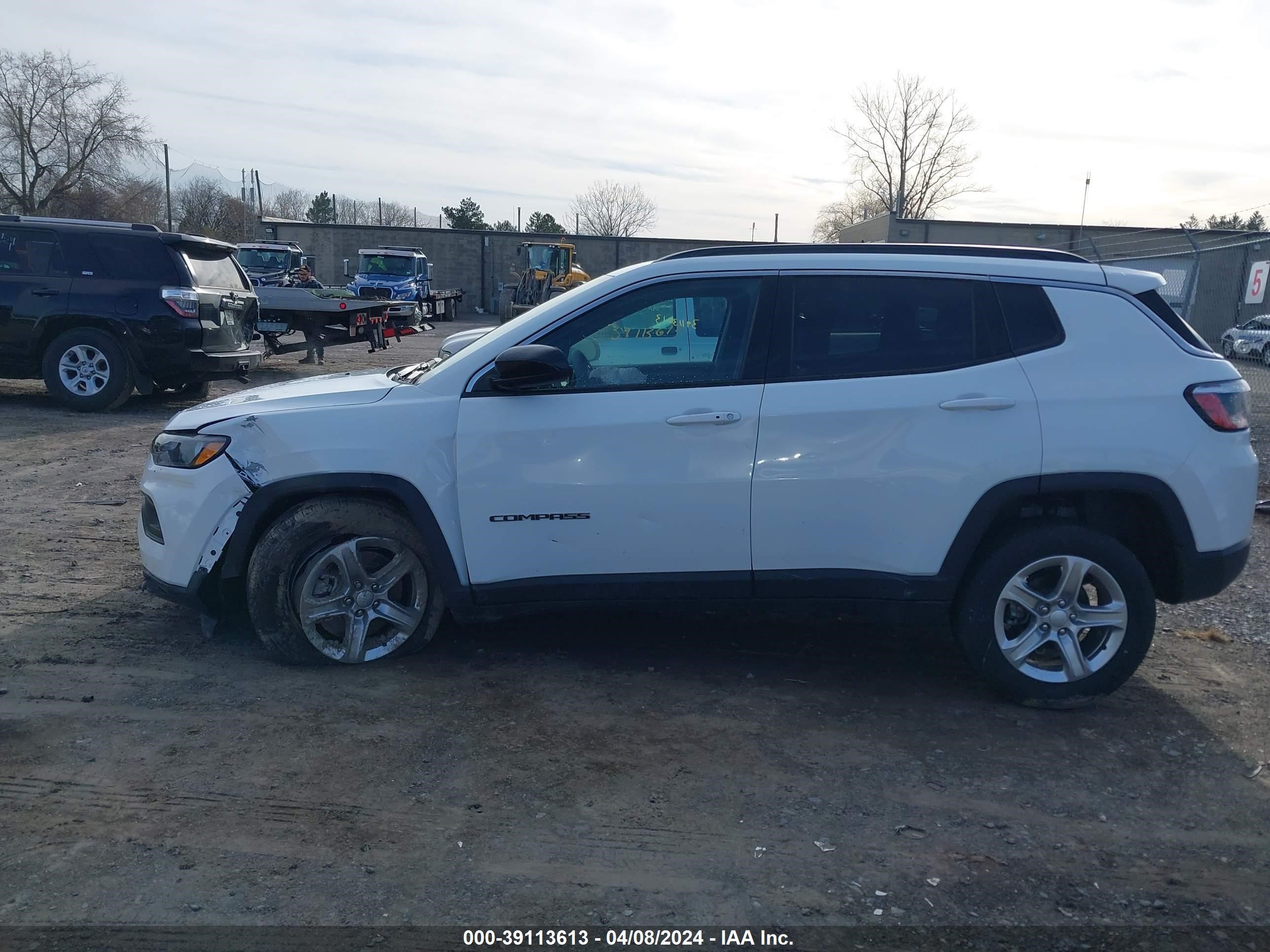 Photo 12 VIN: 3C4NJDBN2RT599115 - JEEP COMPASS 