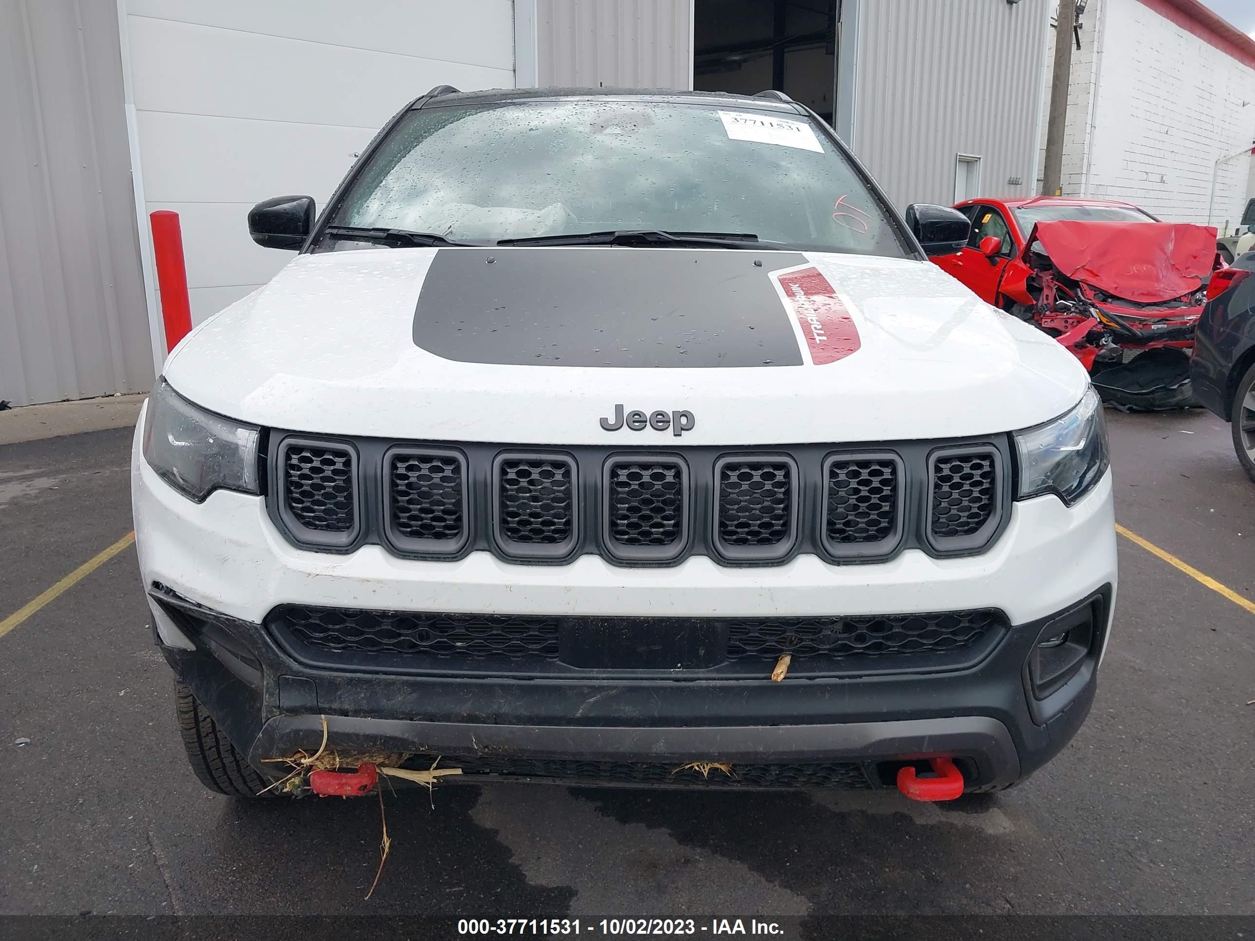 Photo 10 VIN: 3C4NJDDN9PT540881 - JEEP COMPASS 