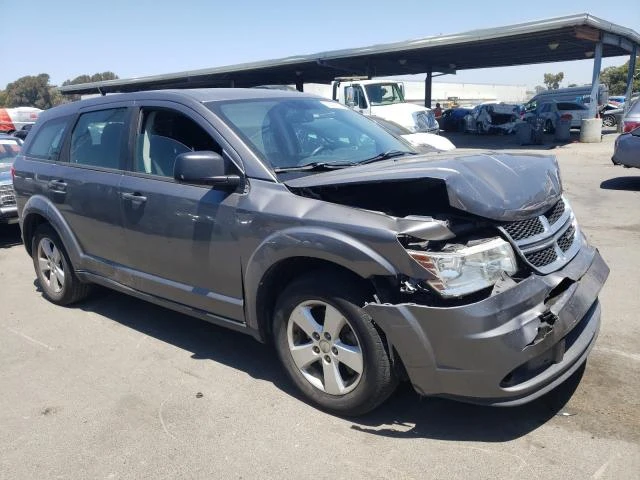 Photo 3 VIN: 3C4PDCAB0DT517702 - DODGE JOURNEY SE 