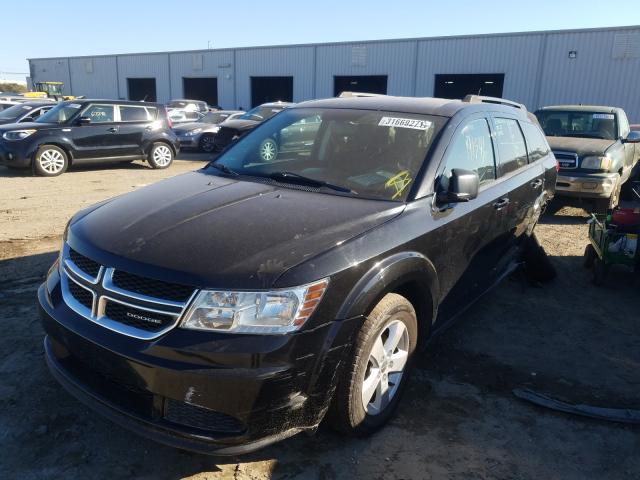 Photo 1 VIN: 3C4PDCAB2CT142801 - DODGE JOURNEY SE 