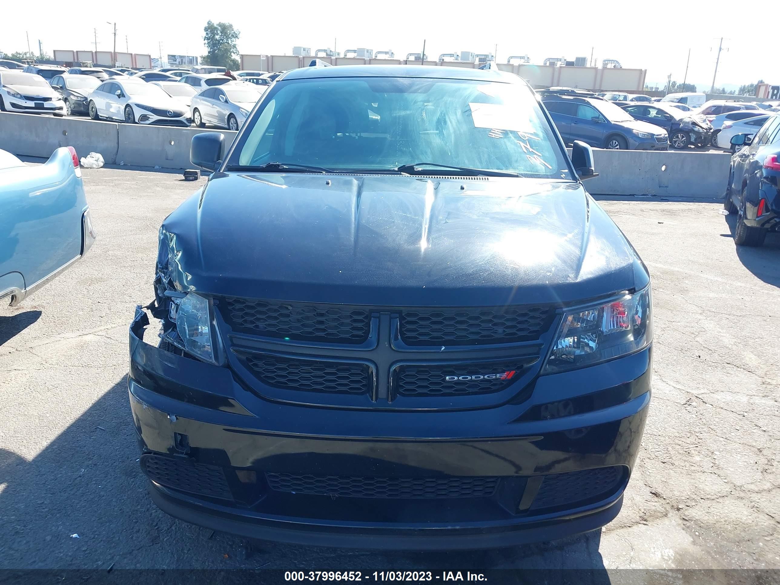 Photo 11 VIN: 3C4PDCAB6JT242557 - DODGE JOURNEY 