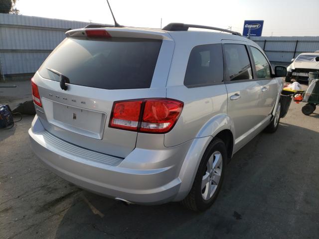 Photo 3 VIN: 3C4PDCAB9CT180090 - DODGE JOURNEY SE 