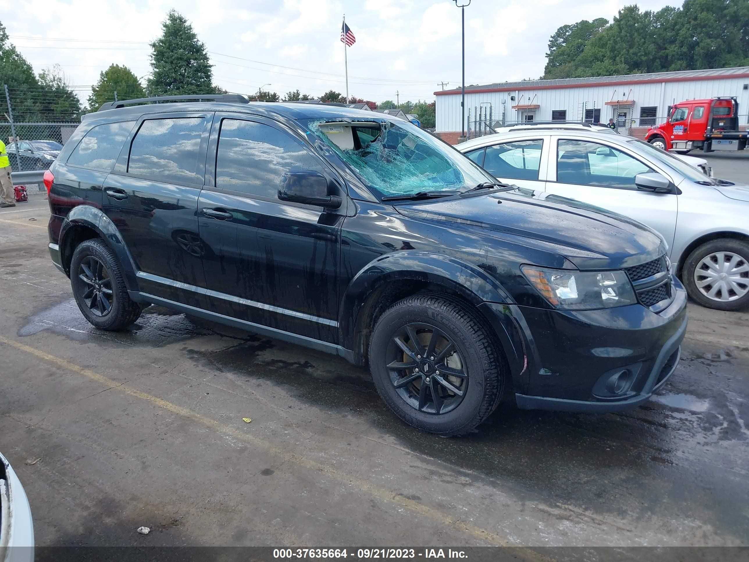 Photo 12 VIN: 3C4PDCBB5KT794311 - DODGE JOURNEY 