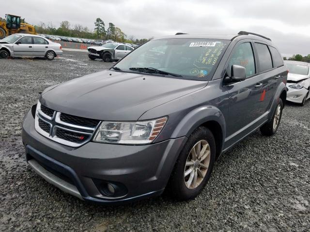 Photo 1 VIN: 3C4PDCBG2DT570914 - DODGE JOURNEY SX 