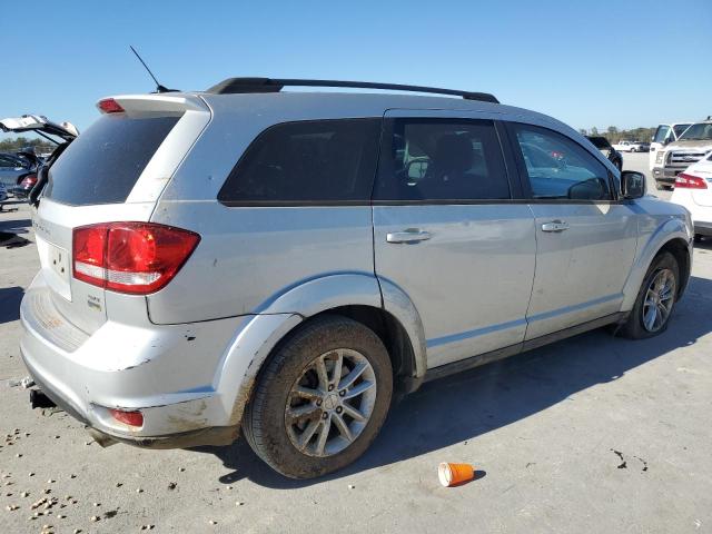 Photo 2 VIN: 3C4PDCBG5DT506690 - DODGE JOURNEY SX 