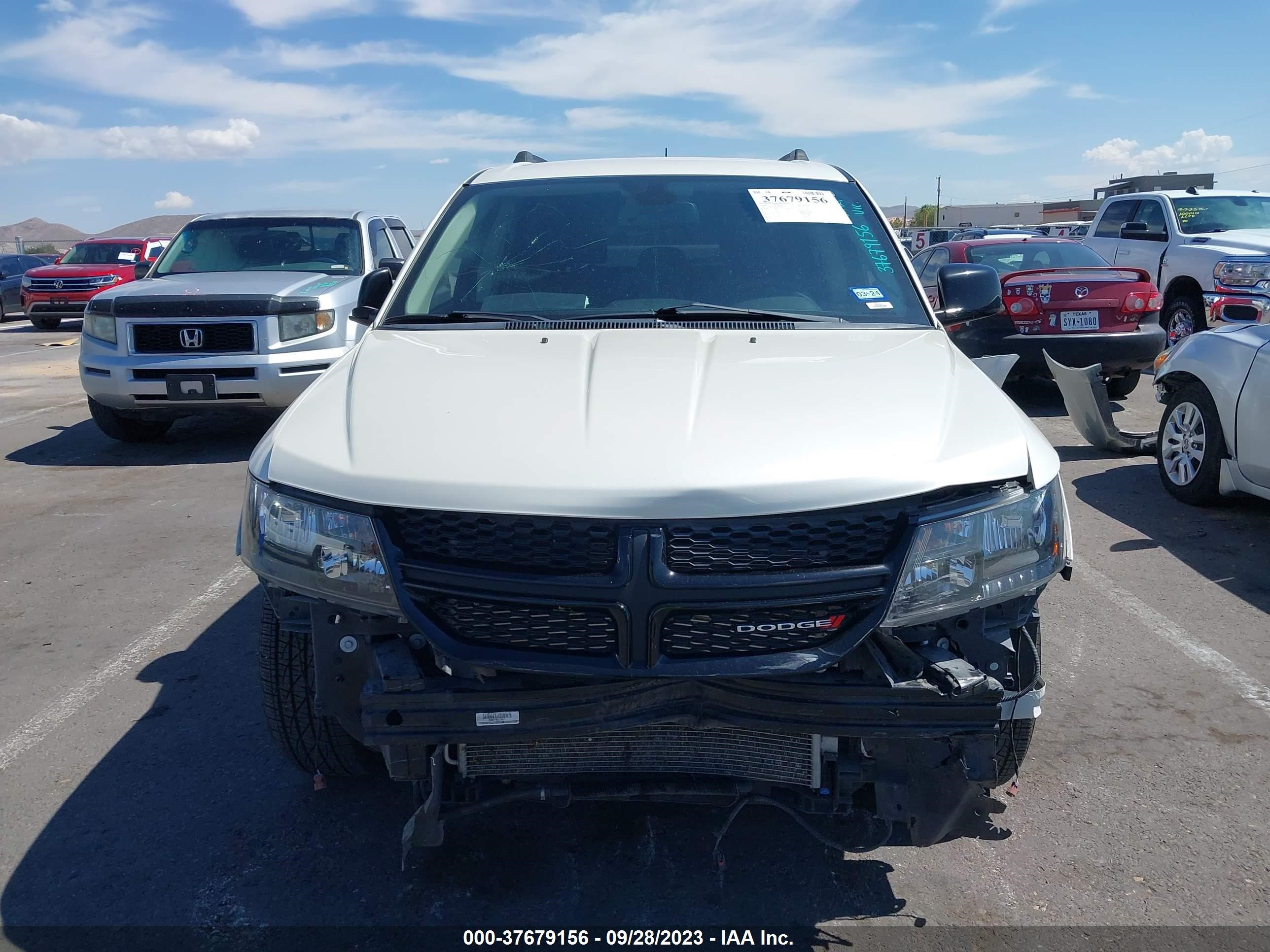 Photo 11 VIN: 3C4PDCBG7KT810374 - DODGE JOURNEY 