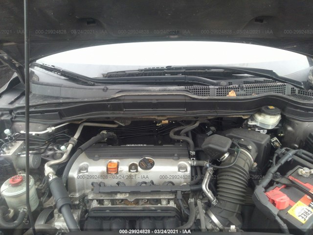 Photo 9 VIN: 3CZRE3H54AG700671 - HONDA CR-V 