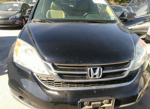 Photo 5 VIN: 3CZRE3H55AG702123 - HONDA CR-V 