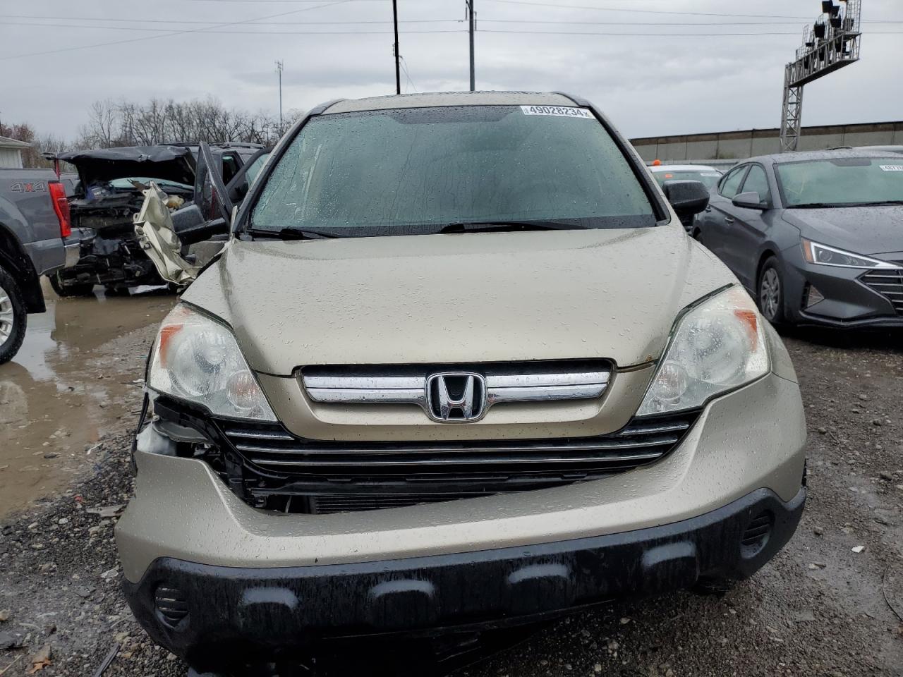 Photo 4 VIN: 3CZRE48549G703104 - HONDA CR-V 