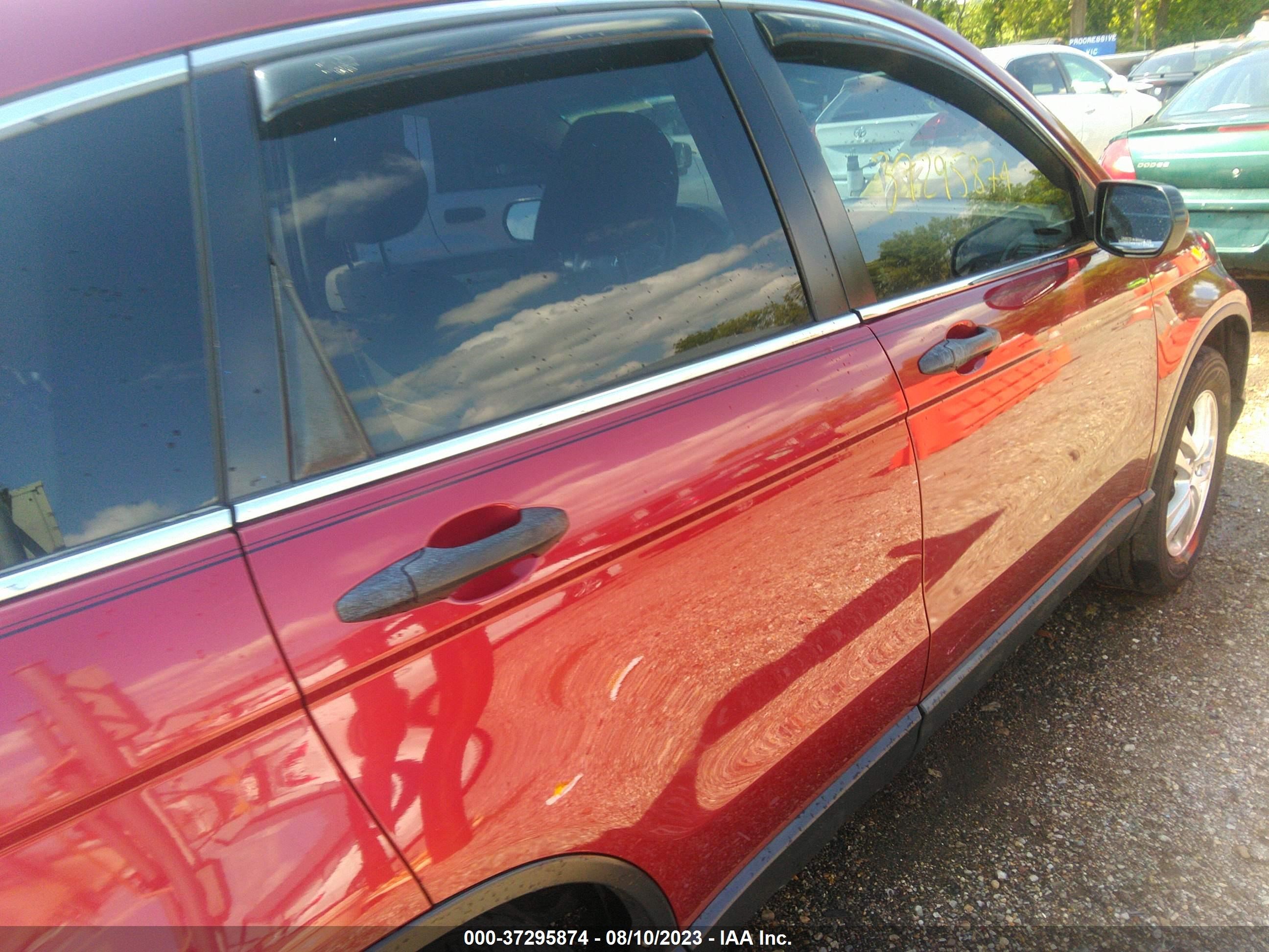 Photo 12 VIN: 3CZRE4H52BG701423 - HONDA CR-V 