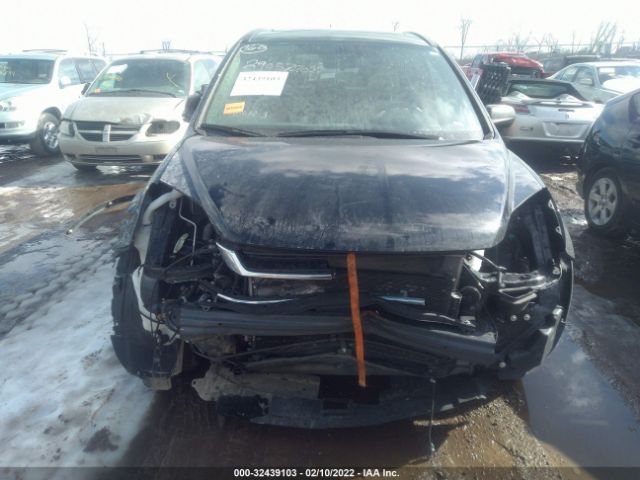 Photo 5 VIN: 3CZRE4H55AG701141 - HONDA CR-V 