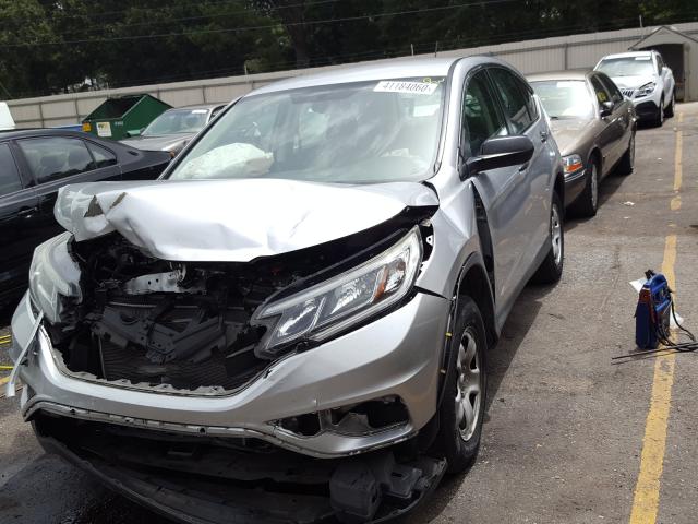 Photo 1 VIN: 3CZRM3H30GG700385 - HONDA CR-V LX 