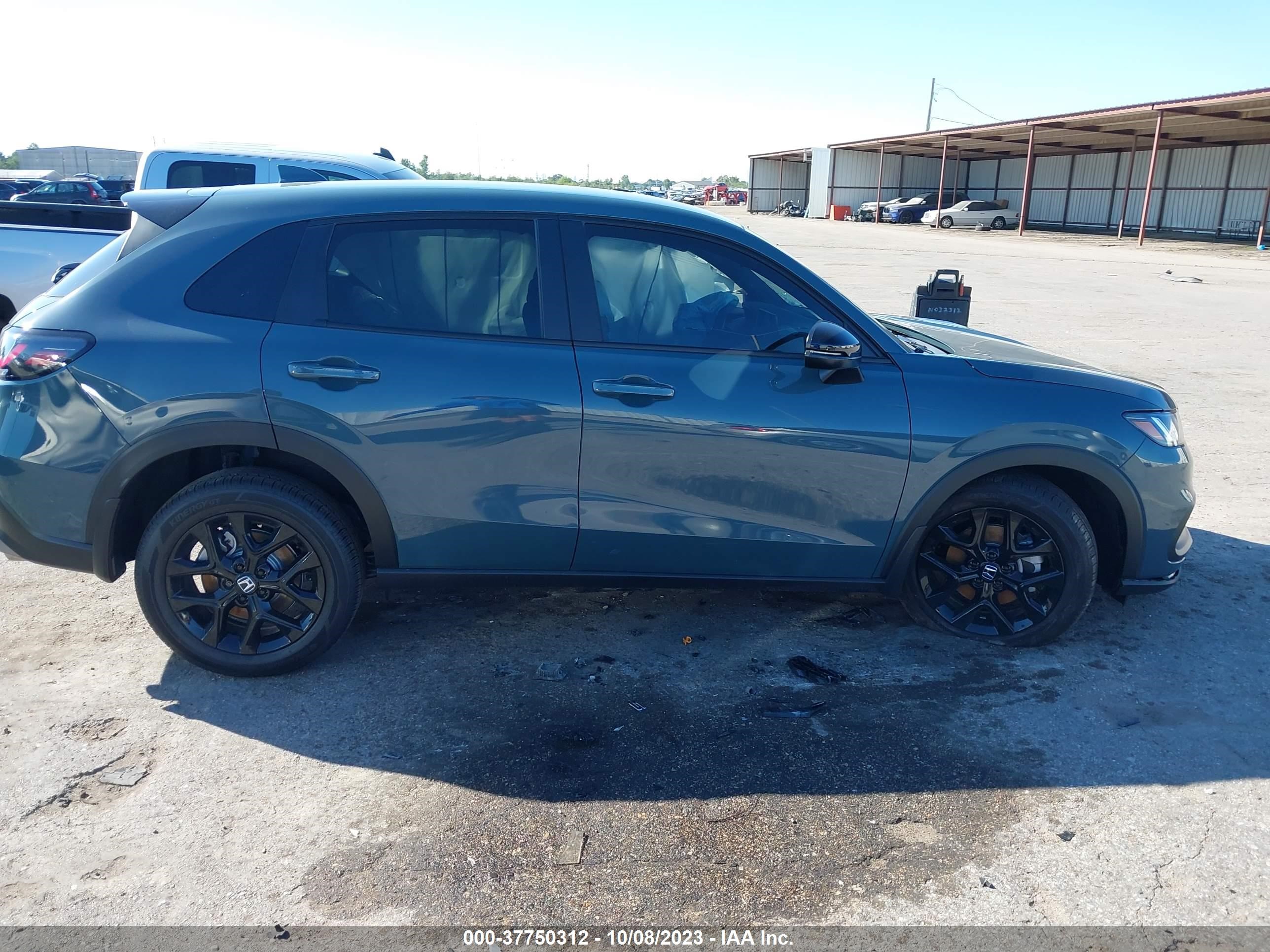 Photo 12 VIN: 3CZRZ1H58RM707953 - HONDA HR-V 