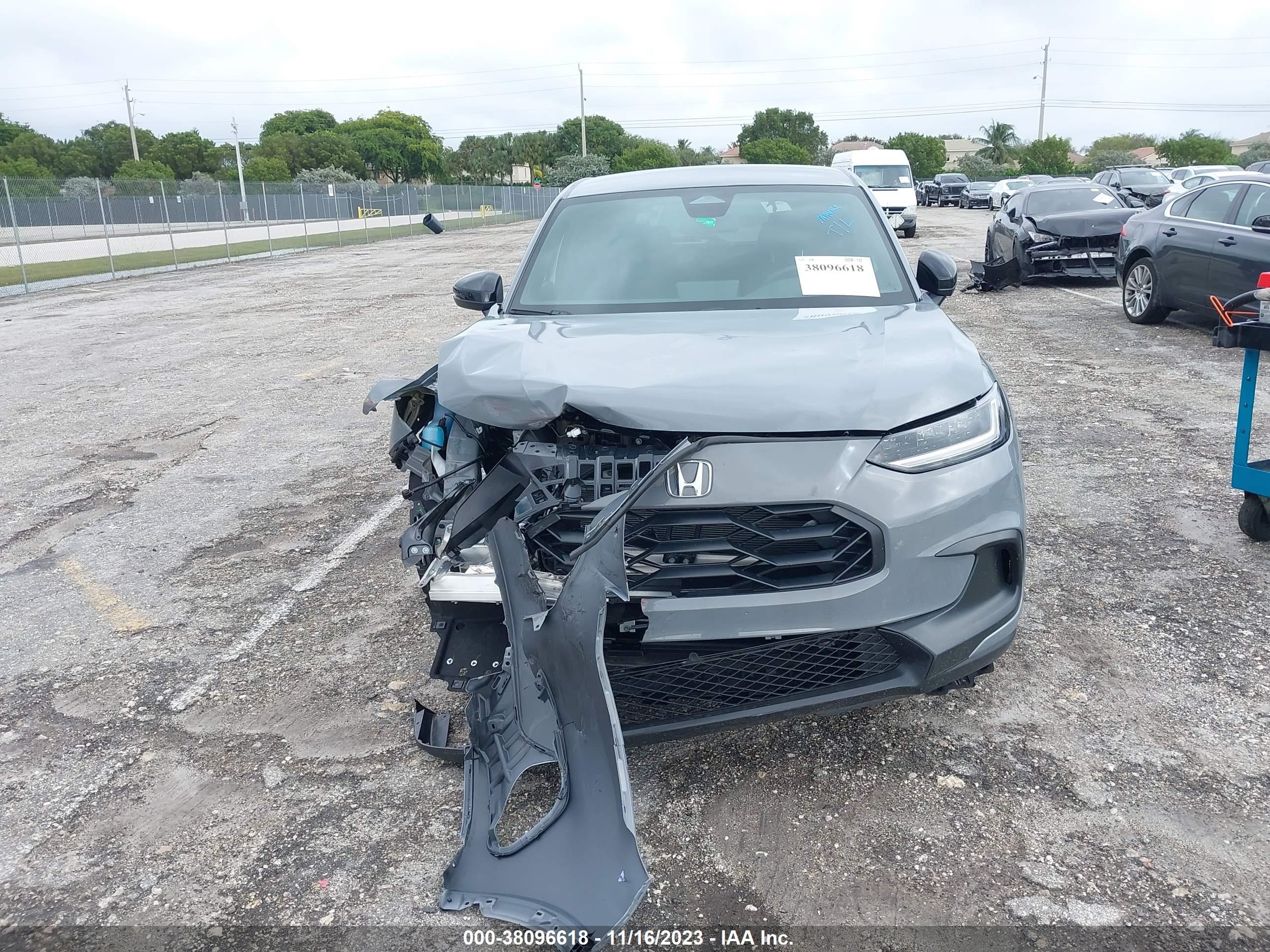 Photo 11 VIN: 3CZRZ1H59RM705077 - HONDA HR-V 