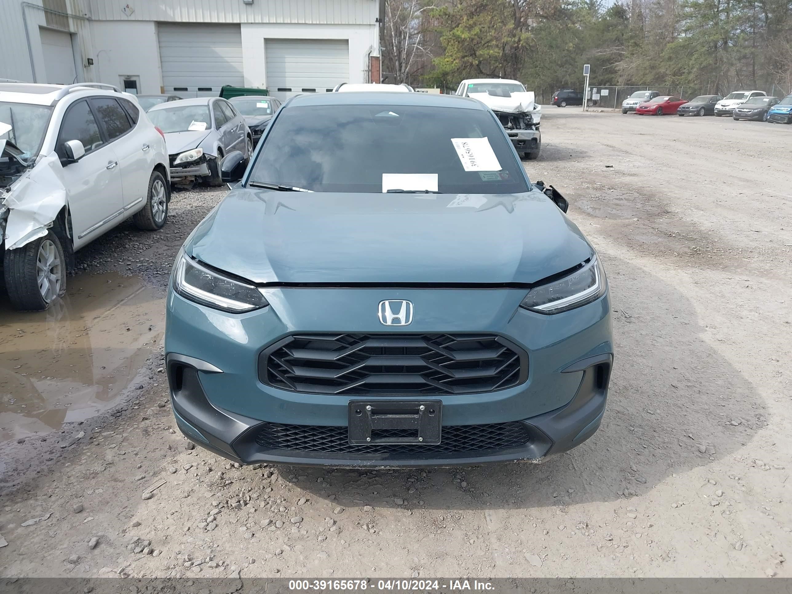 Photo 11 VIN: 3CZRZ2H57RM704032 - HONDA HR-V 