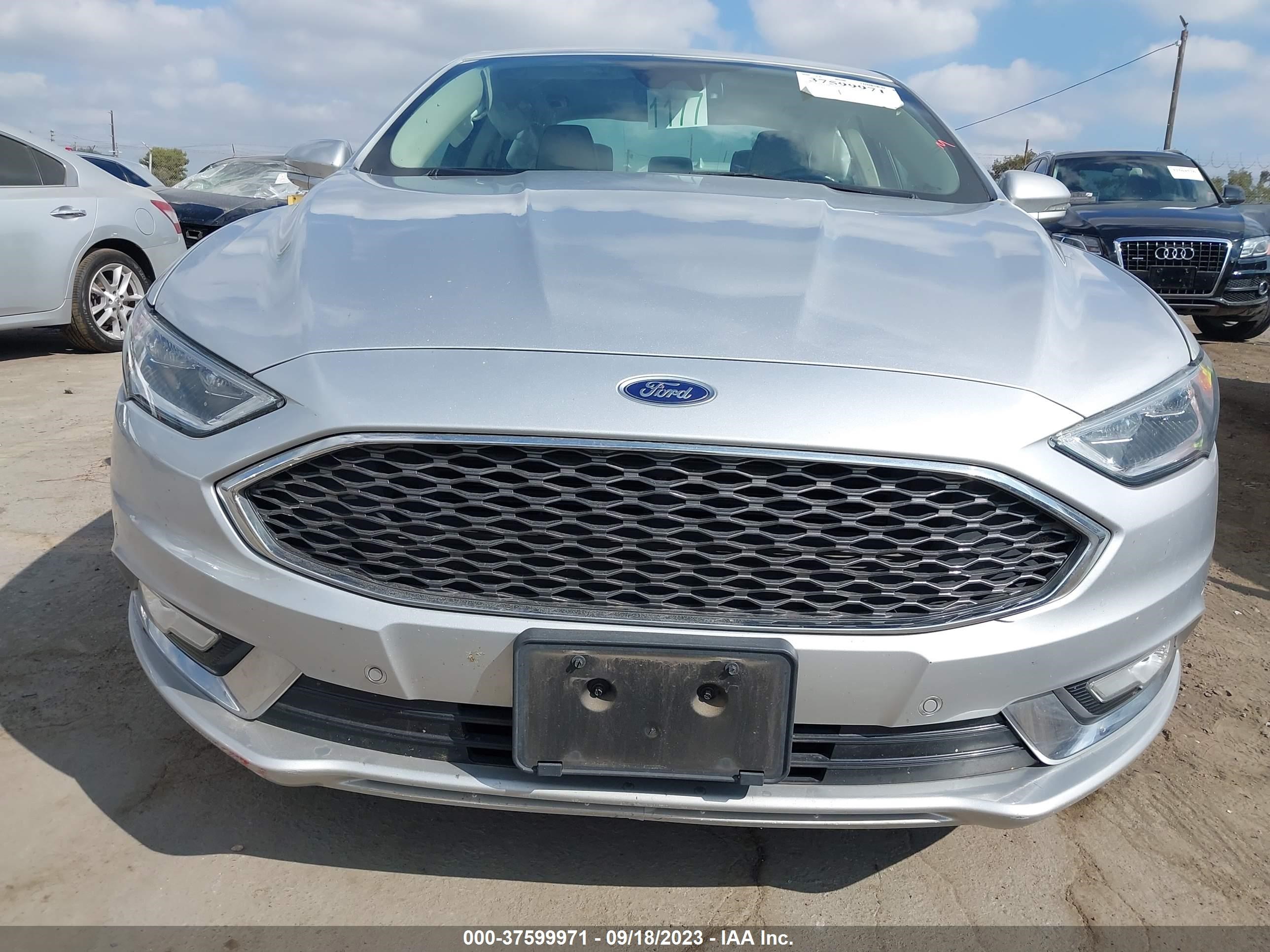 Photo 11 VIN: 3FA6P0D95HR130033 - FORD FUSION 