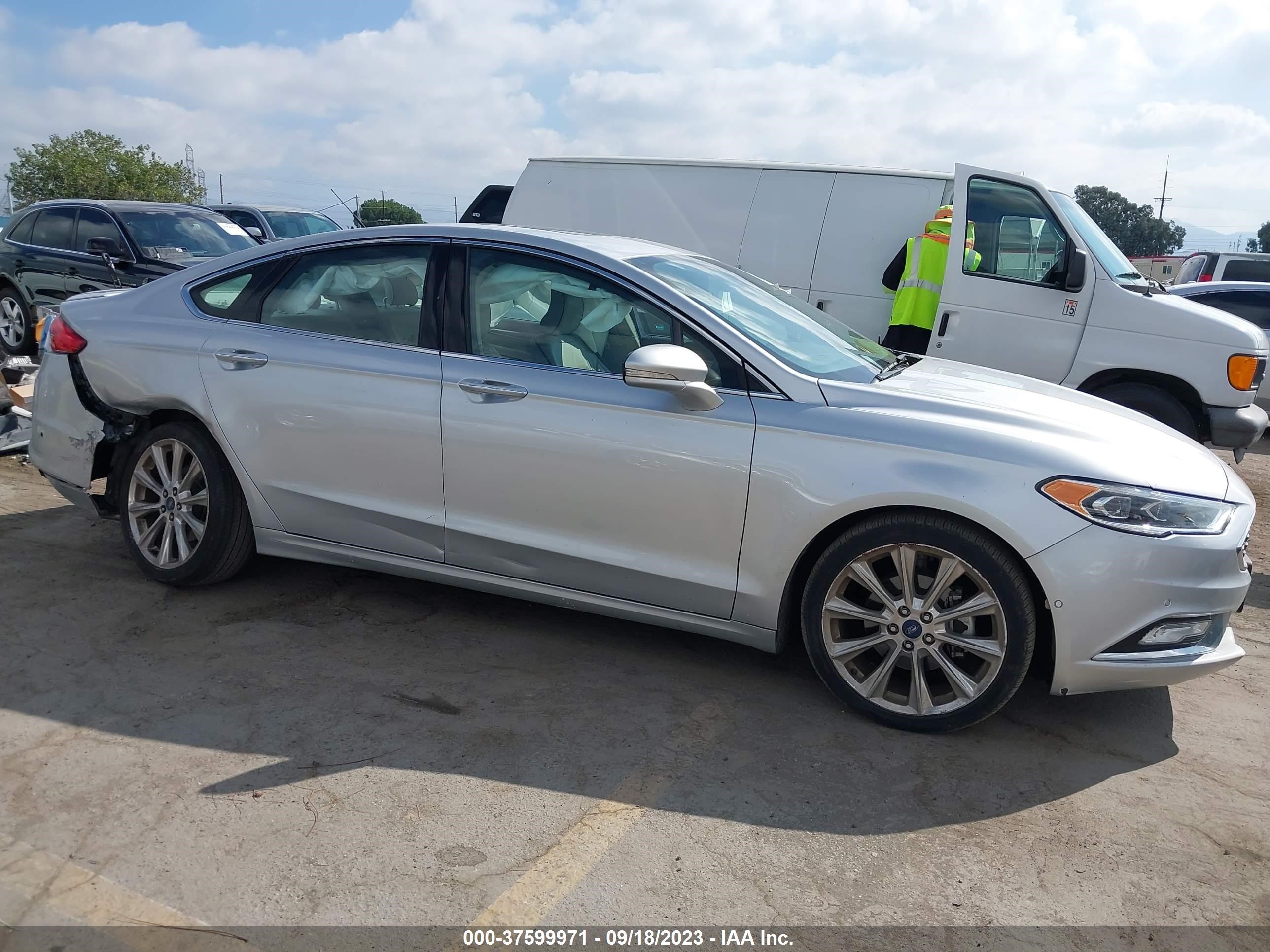 Photo 12 VIN: 3FA6P0D95HR130033 - FORD FUSION 