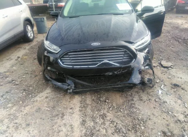 Photo 5 VIN: 3FA6P0G73GR249711 - FORD FUSION 