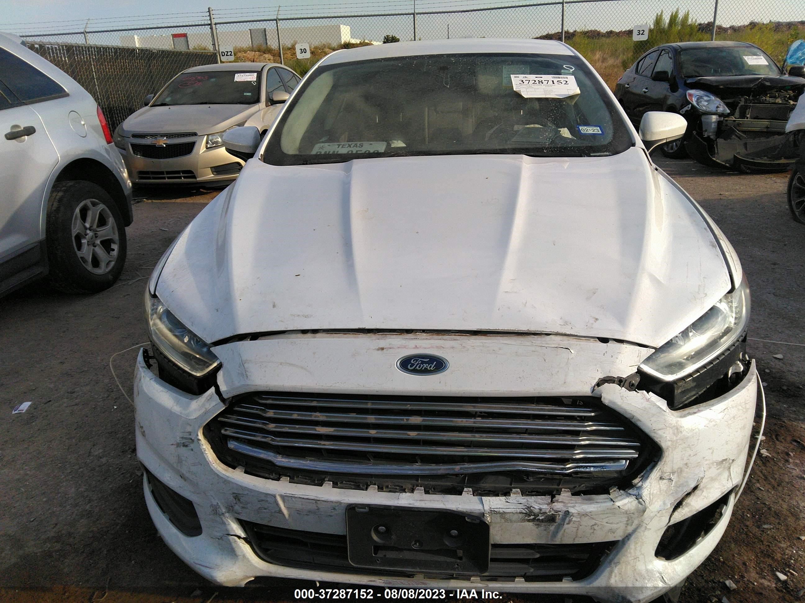 Photo 11 VIN: 3FA6P0G73GR341000 - FORD FUSION 