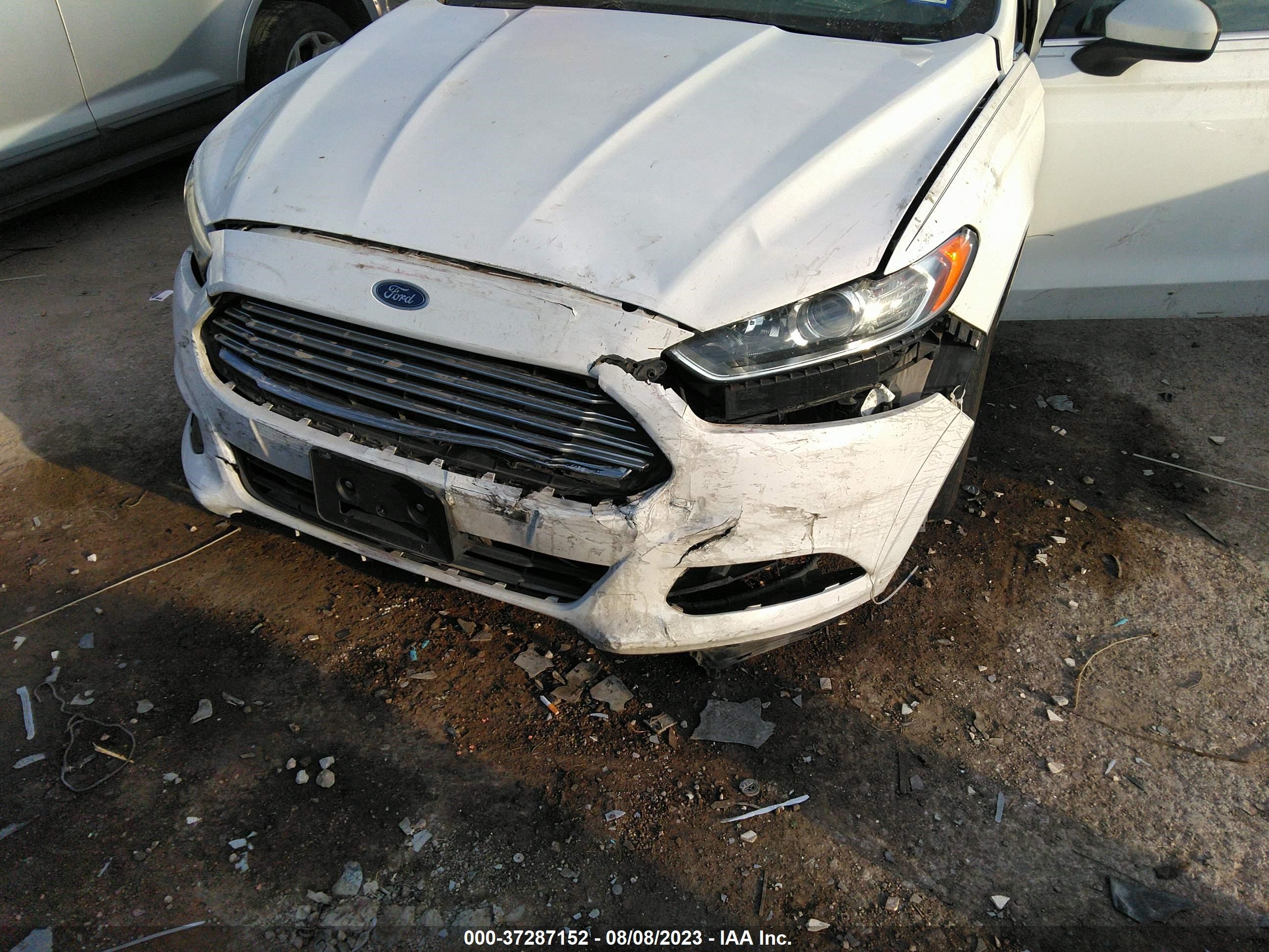 Photo 5 VIN: 3FA6P0G73GR341000 - FORD FUSION 