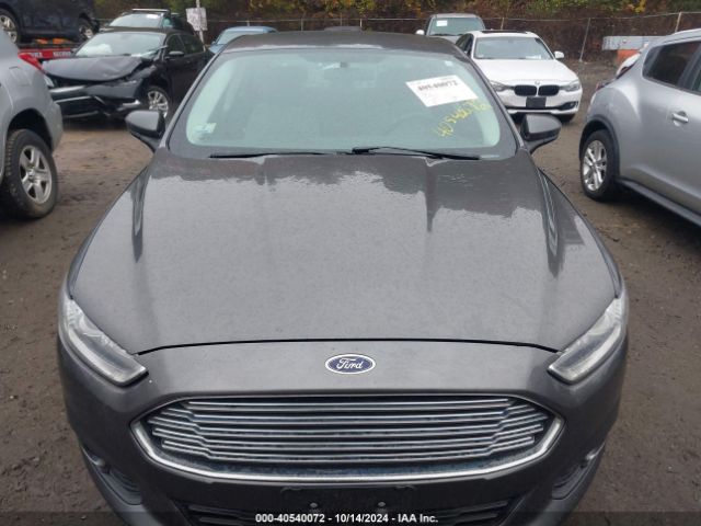 Photo 5 VIN: 3FA6P0G77GR242258 - FORD FUSION 