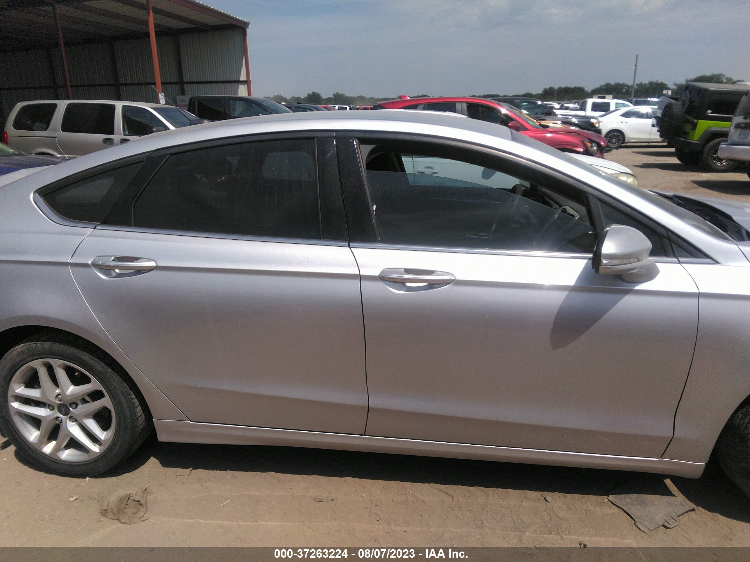 Photo 11 VIN: 3FA6P0H70GR105175 - FORD FUSION 