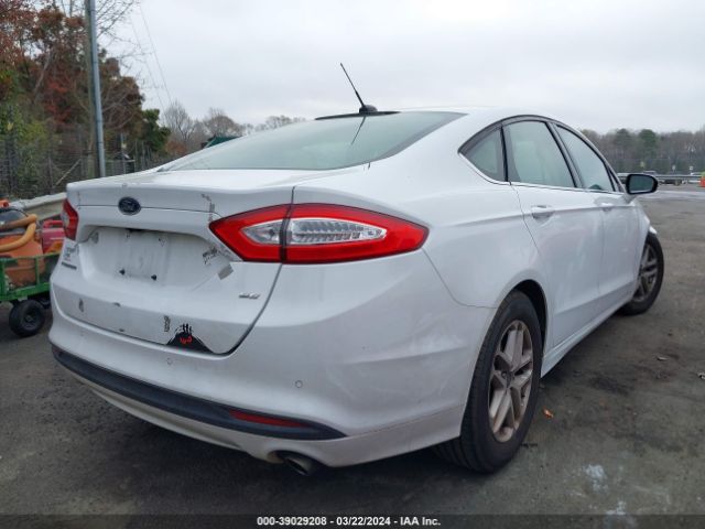 Photo 3 VIN: 3FA6P0H72GR251223 - FORD FUSION 