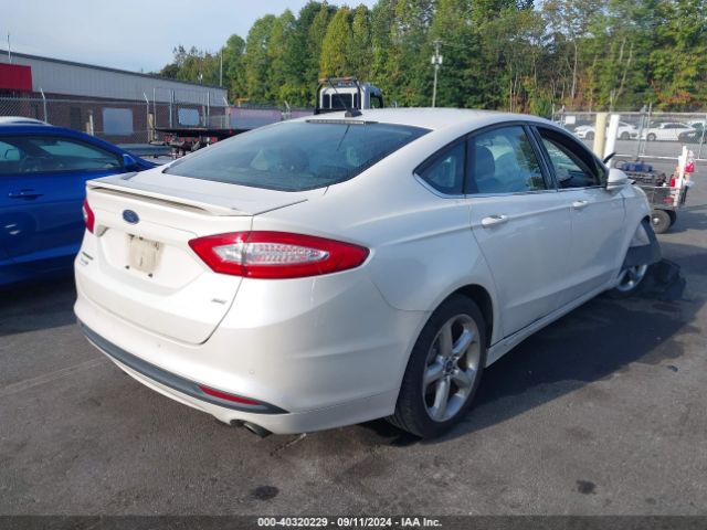 Photo 3 VIN: 3FA6P0H74GR160406 - FORD FUSION 