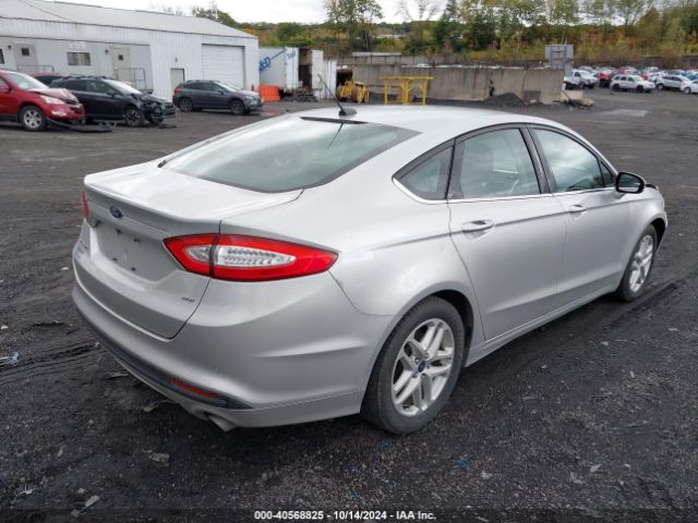 Photo 3 VIN: 3FA6P0H74GR272882 - FORD FUSION 