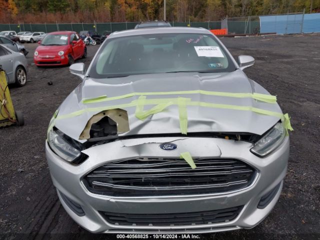 Photo 5 VIN: 3FA6P0H74GR272882 - FORD FUSION 