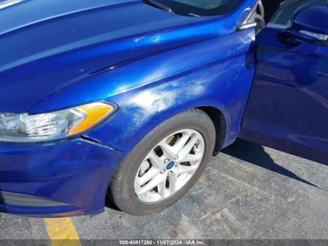 Photo 5 VIN: 3FA6P0H74GR330487 - FORD FUSION 