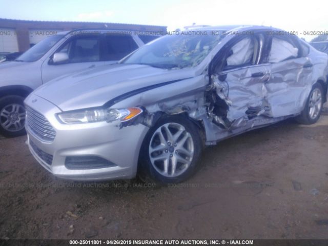 Photo 5 VIN: 3FA6P0H74GR343630 - FORD FUSION 