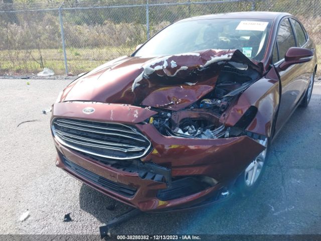 Photo 5 VIN: 3FA6P0H74GR392021 - FORD FUSION 