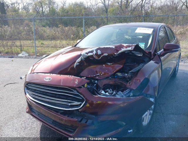 Photo 9 VIN: 3FA6P0H74GR392021 - FORD FUSION 