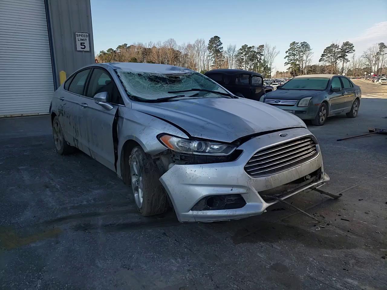 Photo 10 VIN: 3FA6P0H74GR402790 - FORD FUSION SE 